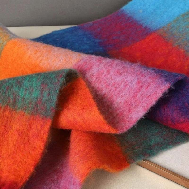 Elena | De kleurrijke sjaal die elke outfit in één beweging afmaakt.